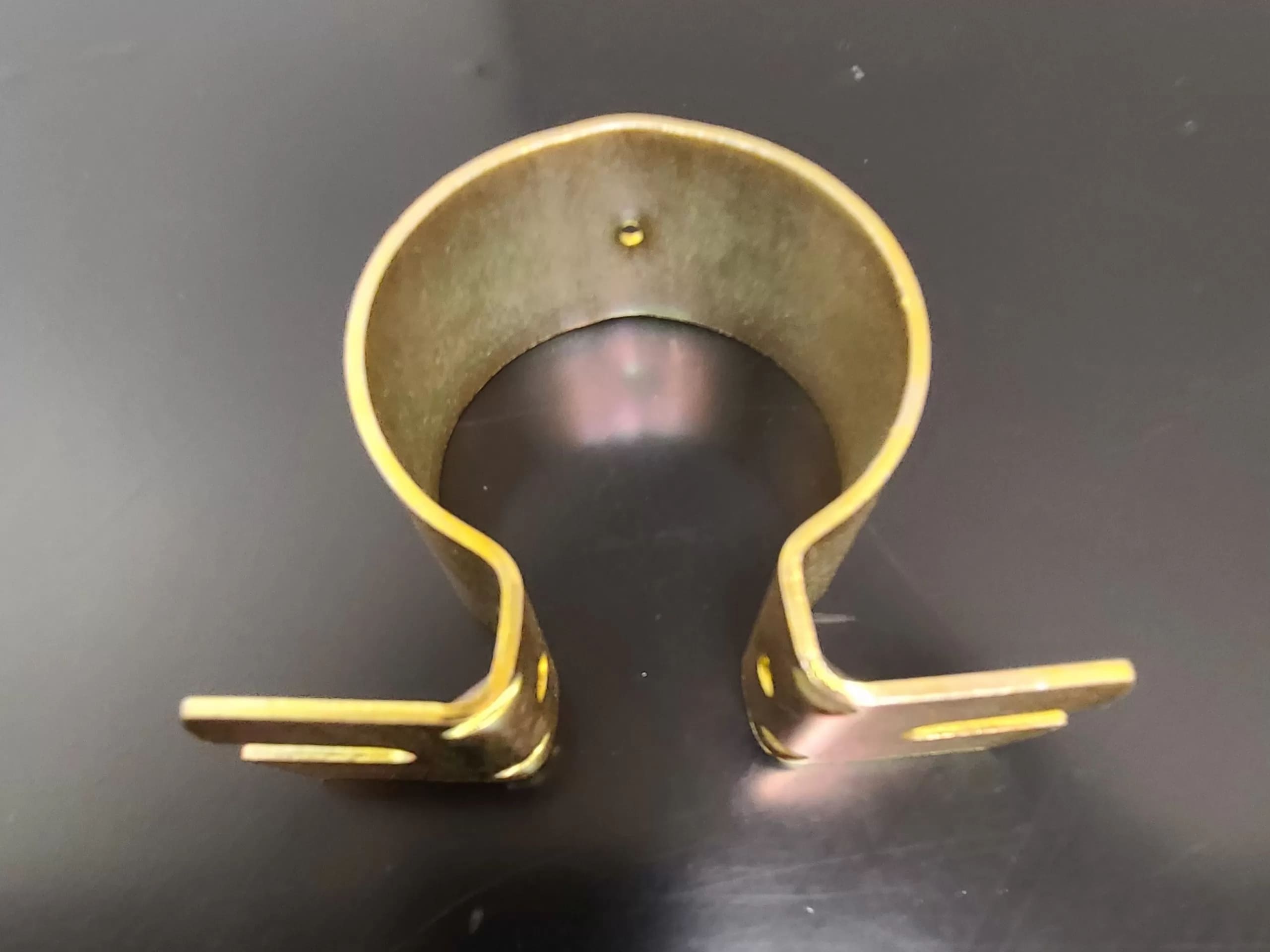 metal part in brass finish