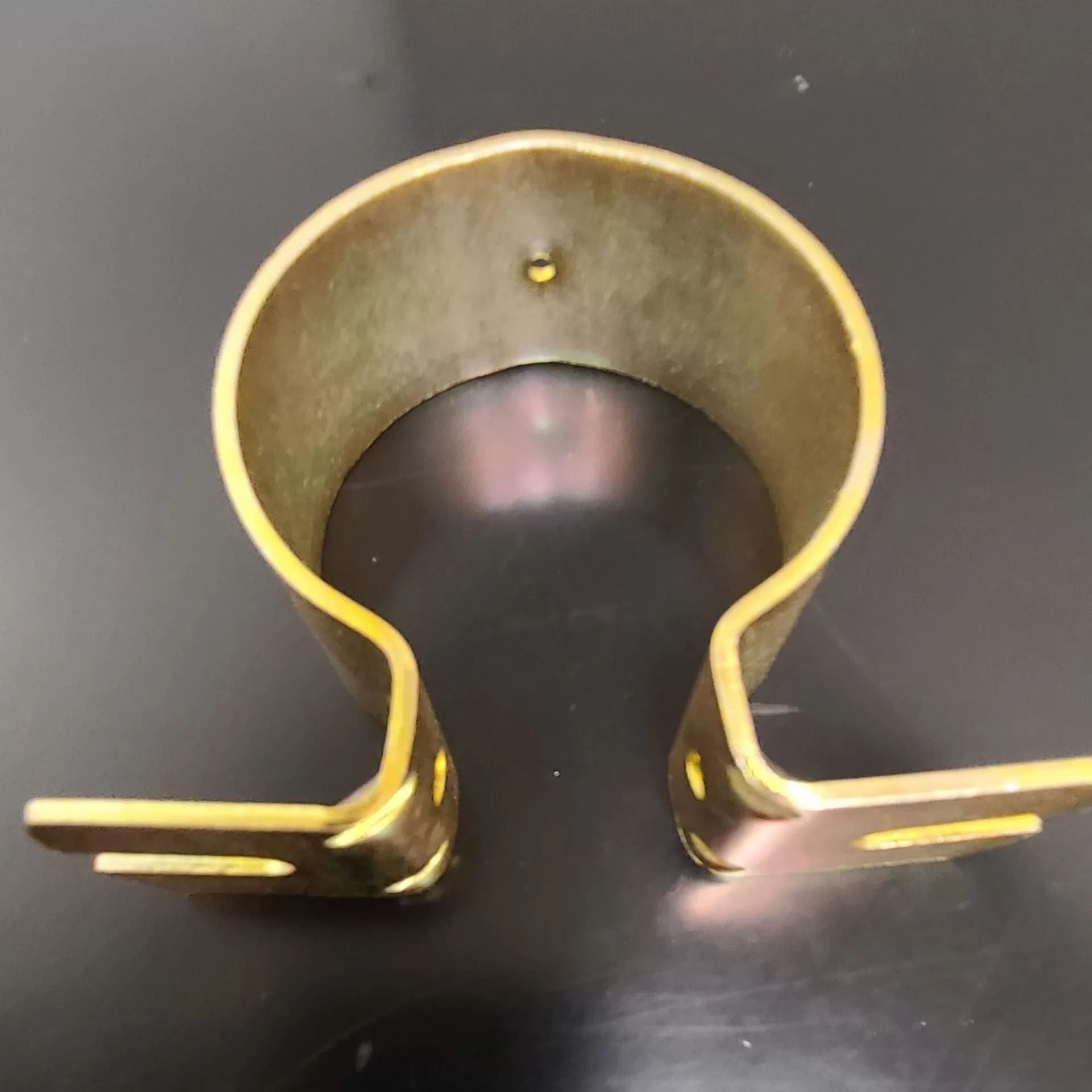 metal part in brass finish